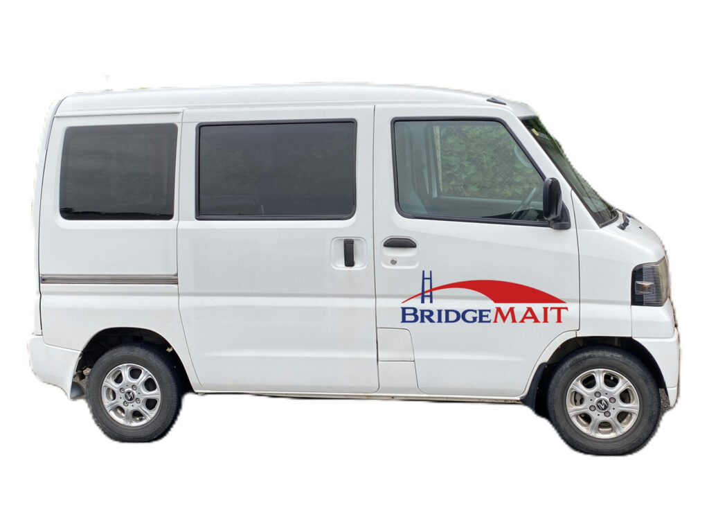 Side view of the BridgeMAIT compact wheelchair-accessible van