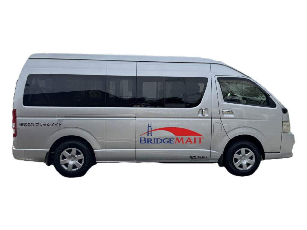 Side view of the BridgeMAIT Toyota HiAce wheelchair-accessible van